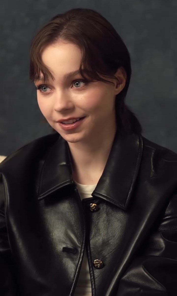 short-haired beauty wearing leather jacket